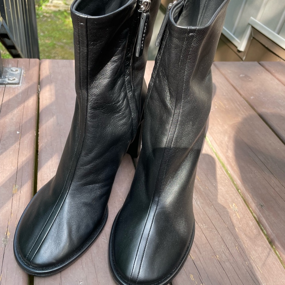 The Row black leather botts in size 39